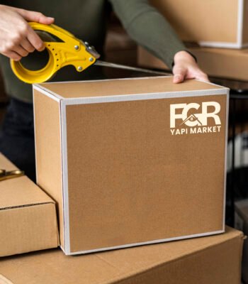 Small business owner packing product parcel boxes for delivery